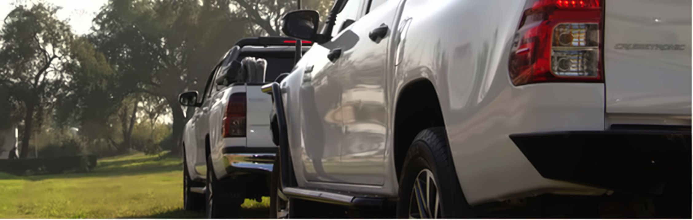 RRS white patrol pickup trucks parked in formation